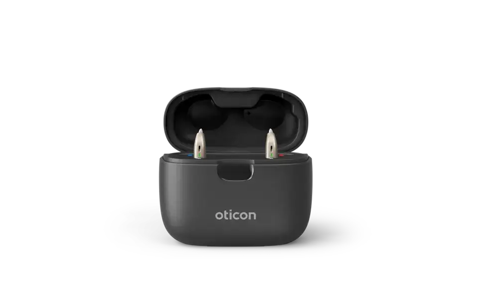 This smart charger by Oticon redefines convenience, offering fast, efficient charging for your hearing aids, ensuring they're always ready when you are.